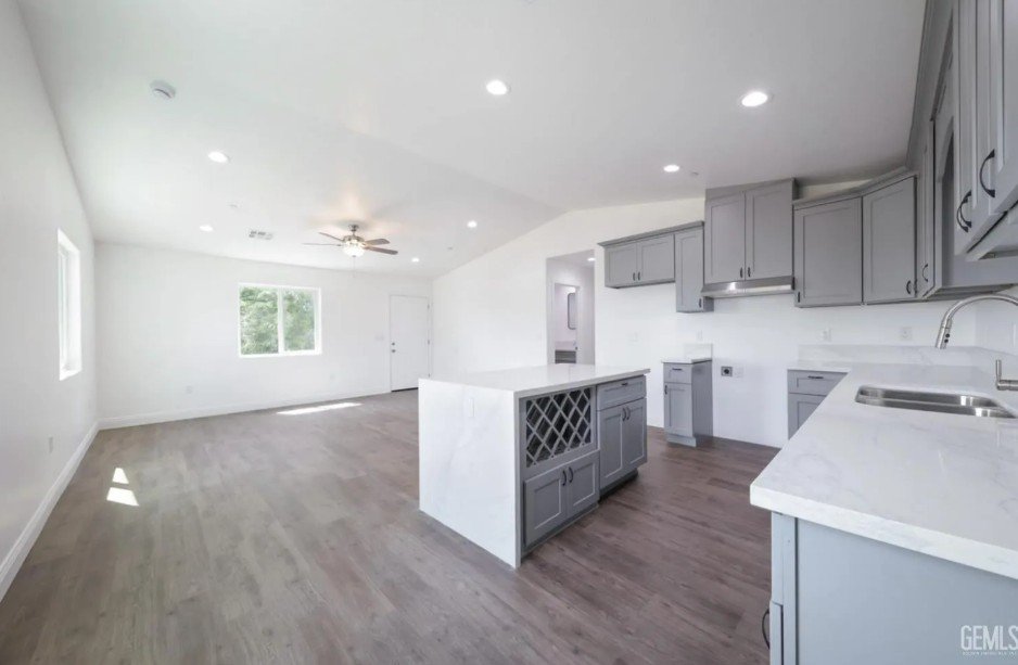 Open kitchen and living area in a residence featured by Zhao Homes